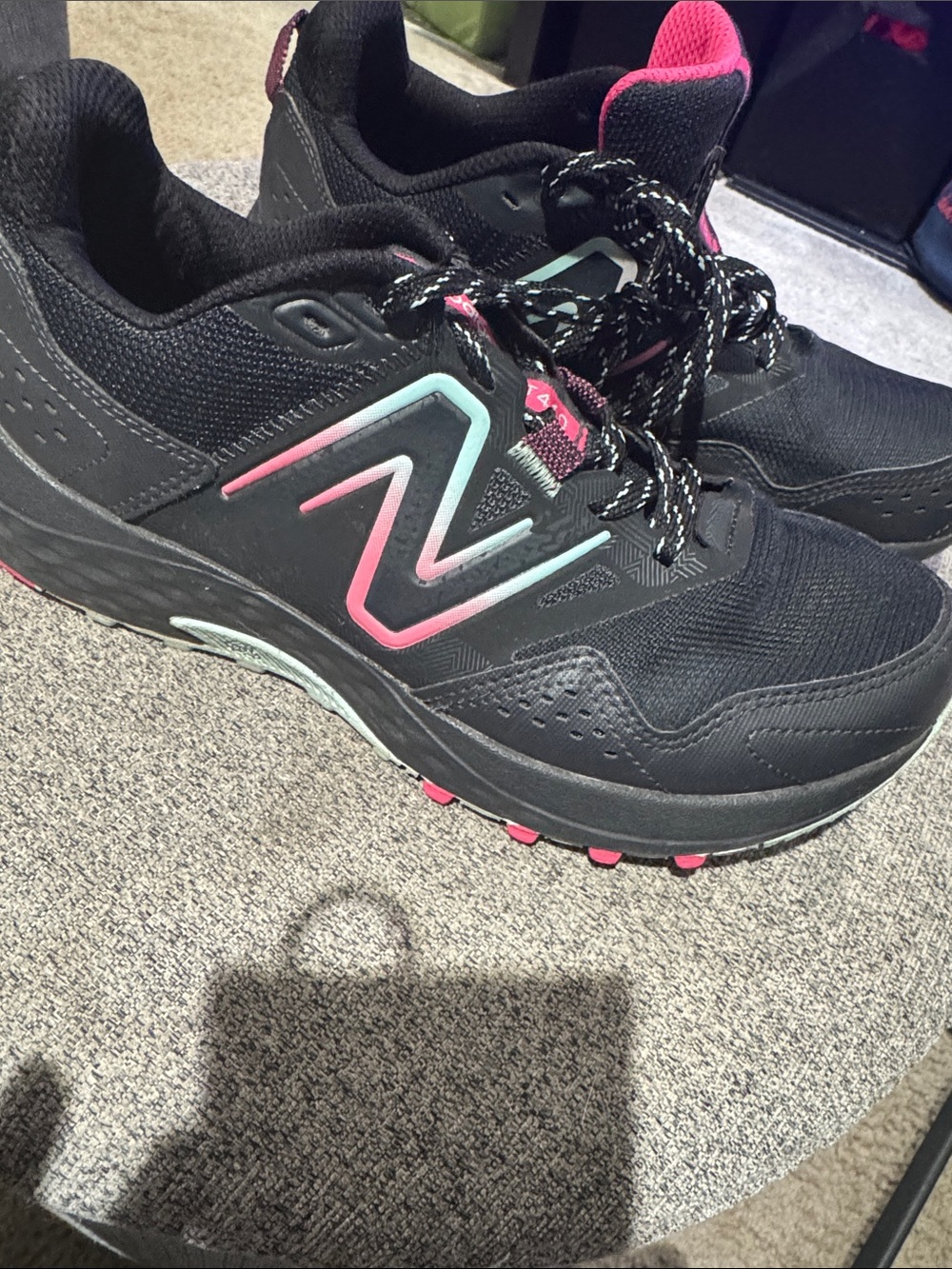 New Balance Women’s Black Athletic Sneakers with Pink and Teal Accents